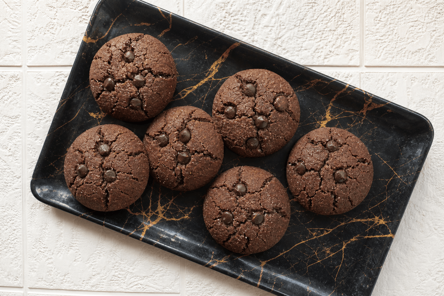 Chocolate Nankhatai — cocoa-deepened crumb folded with dark-chocolate chips